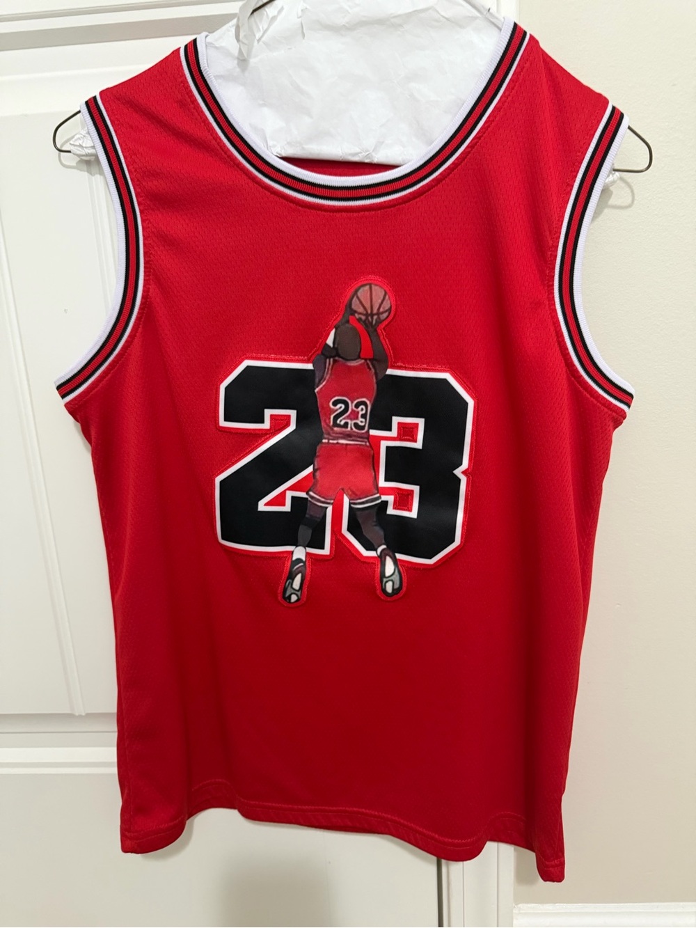 Red Basketball Jersey with Number 23 Graphic